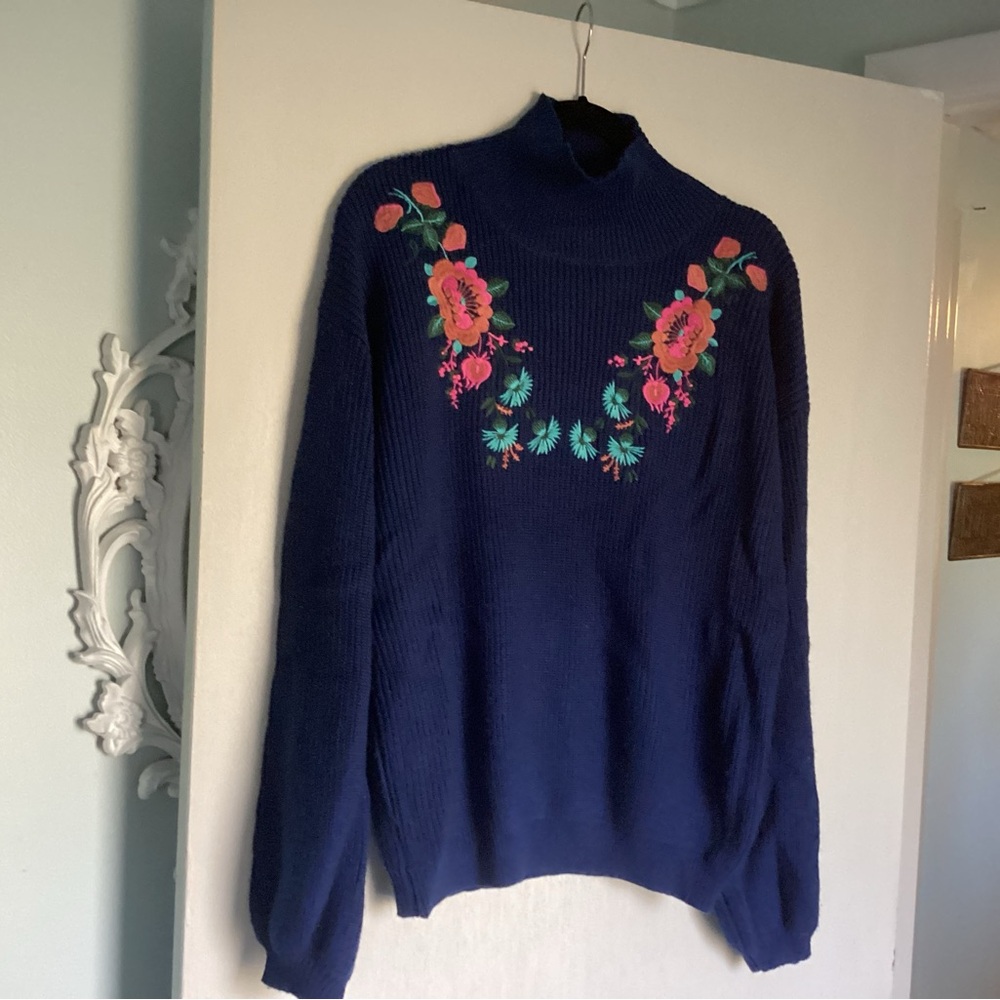2 sweaters with floral details